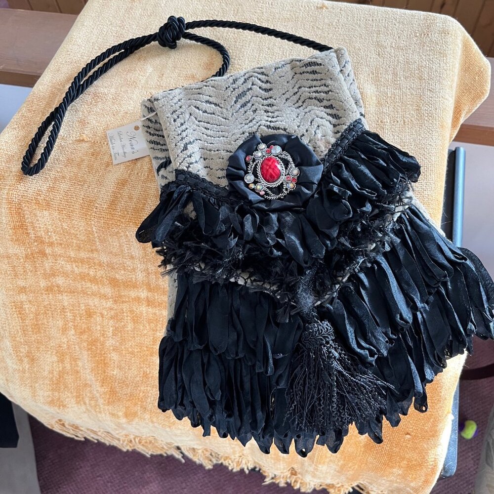 Nona's of Texas fancy, fringed ladies hand bag